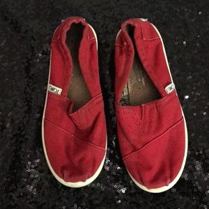 Red flexible sole toms for toddler